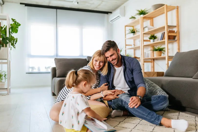 Family sitting together in an East Bethel house
