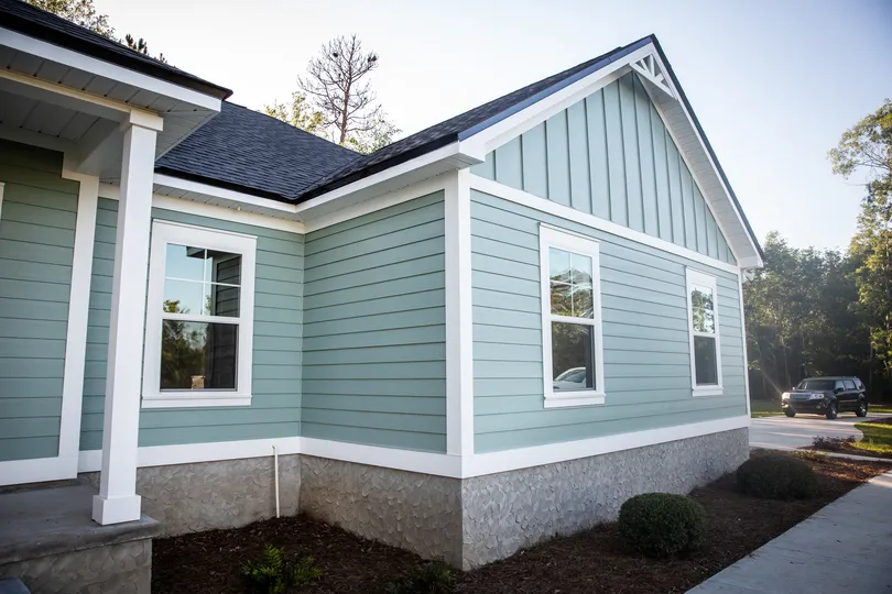 Light blue LP Smartside siding on a house in Zimmerman 