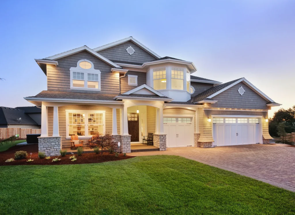New home in Stillwater with lots of lights and a green lawn