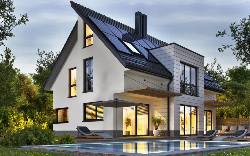 A white house with a black roof and a fancy pool in Minneapolis