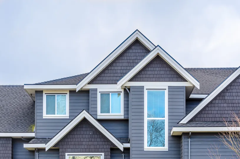 New windows in a blue house in Rogers