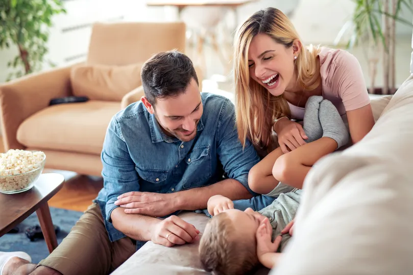 Happy homeowner family in an Excelsior home