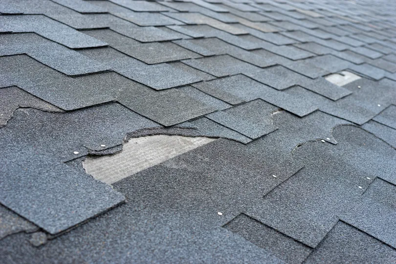 Roof damage signs on a Minnetonka home