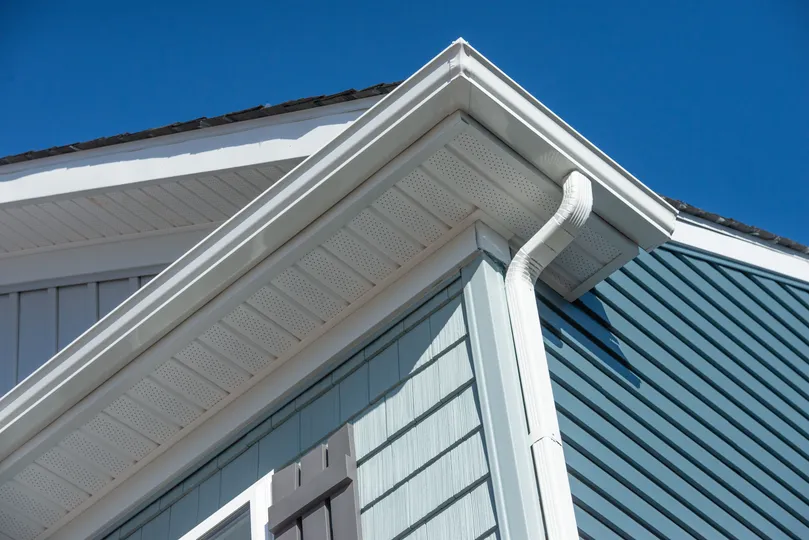 White new gutters for a home in Maple Grove