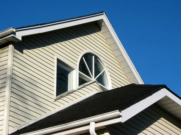 Yellow siding for a house in Excelsior