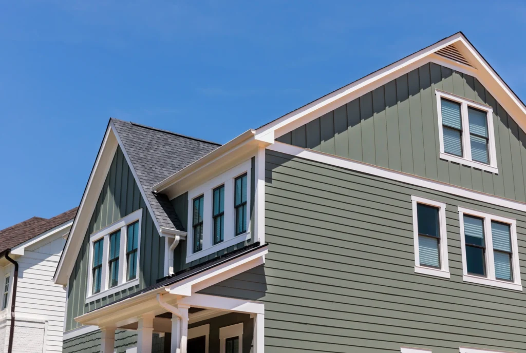 sleek green siding installed on excelsior mn home