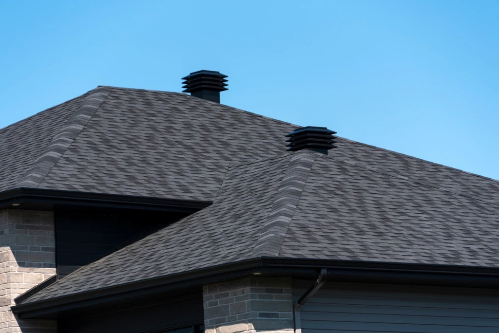 house black shingle roof and ventilation