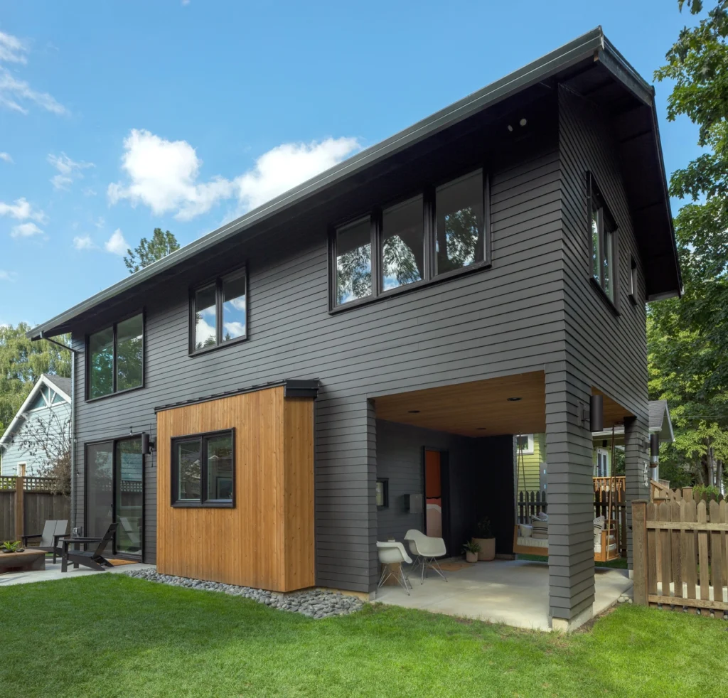 new siding installation on elk river home with dark black-grey siding colors