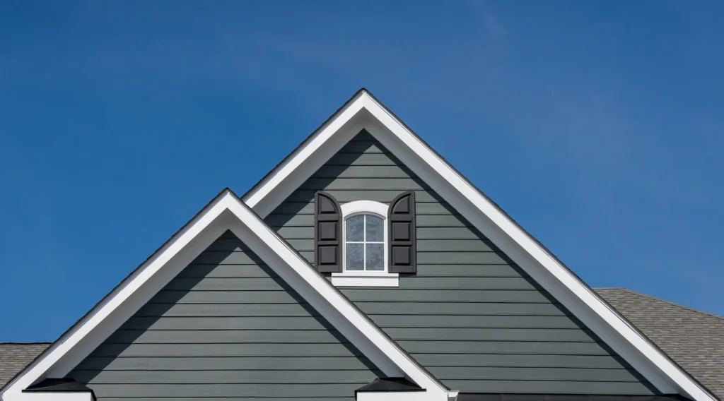 dark grey siding installation on elk river mn home