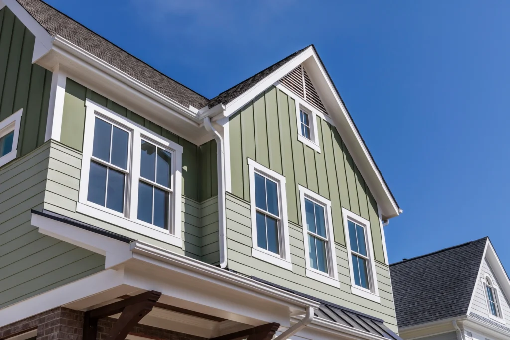 close up view of vertical siding installation in wayzata mn - green siding