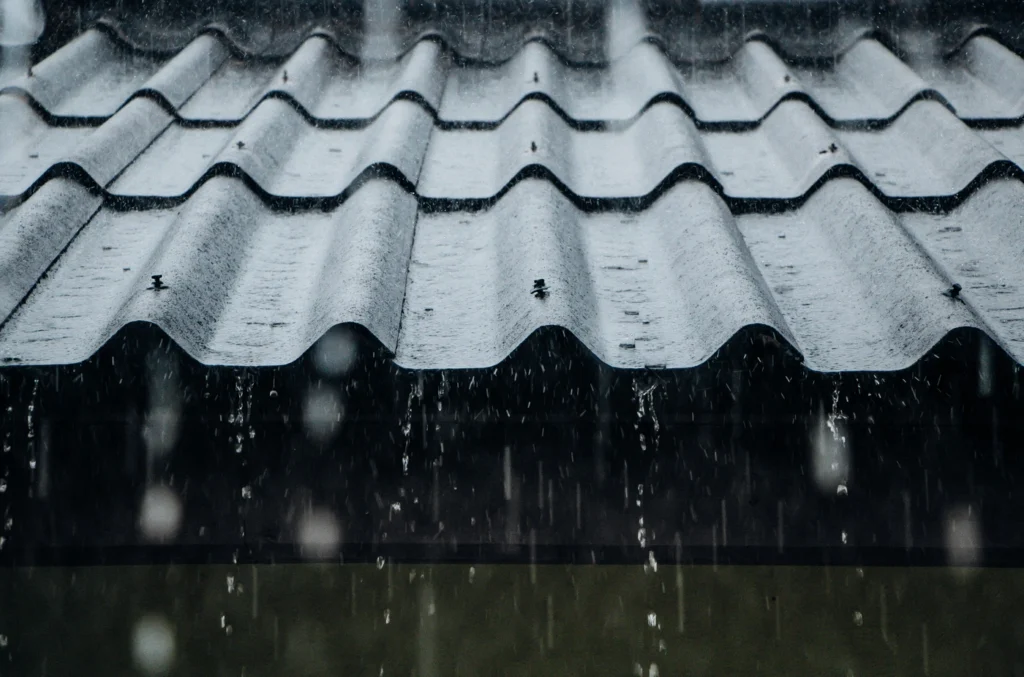 close up view of metal roofing system in the rain