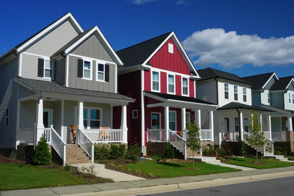 neighborhood in stillwater mn with new siding installation - red and grey and white