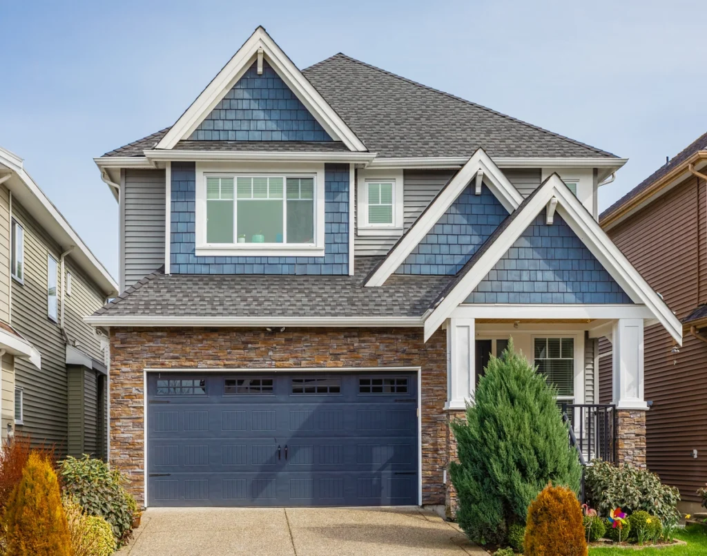 single family house with new shingle roof
