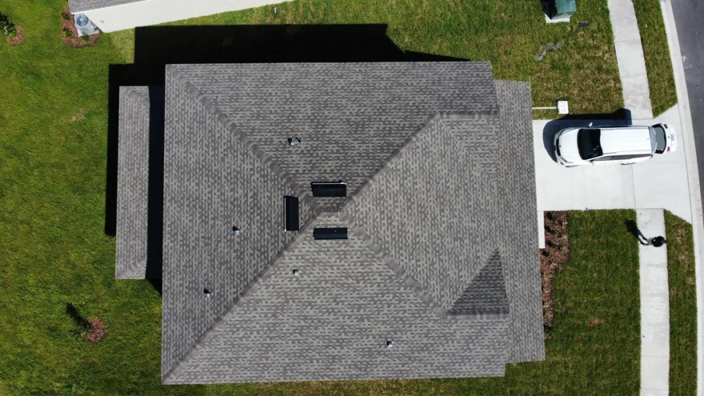 house aerial view of shingle roof