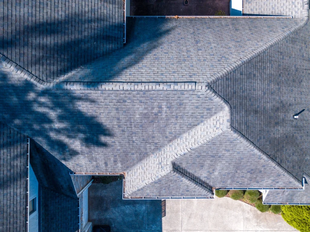 large house asphalt shingle roof view