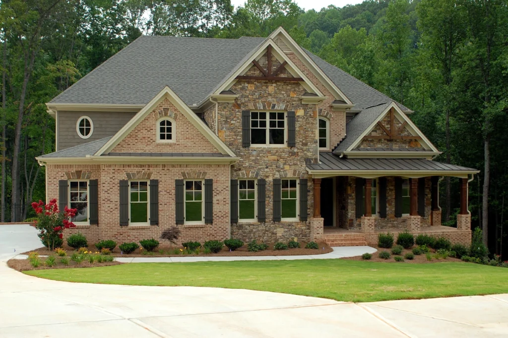 brick house with shingle roof