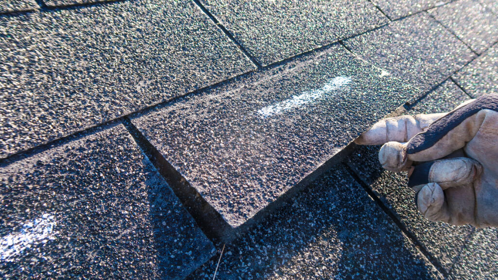 close up to loose asphalt shingle