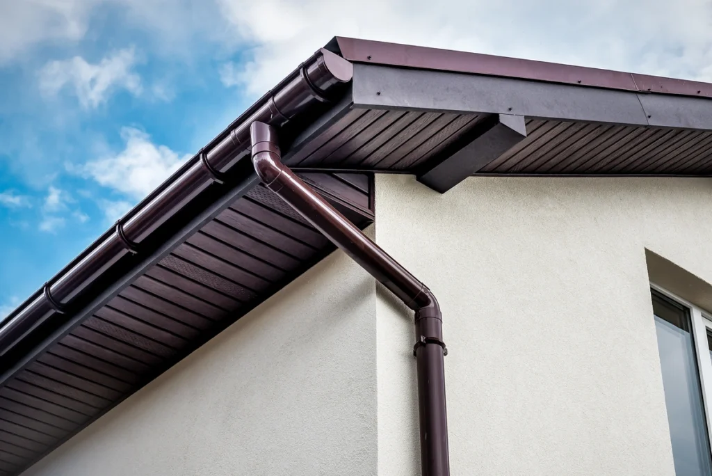 close up to house metal gutter system