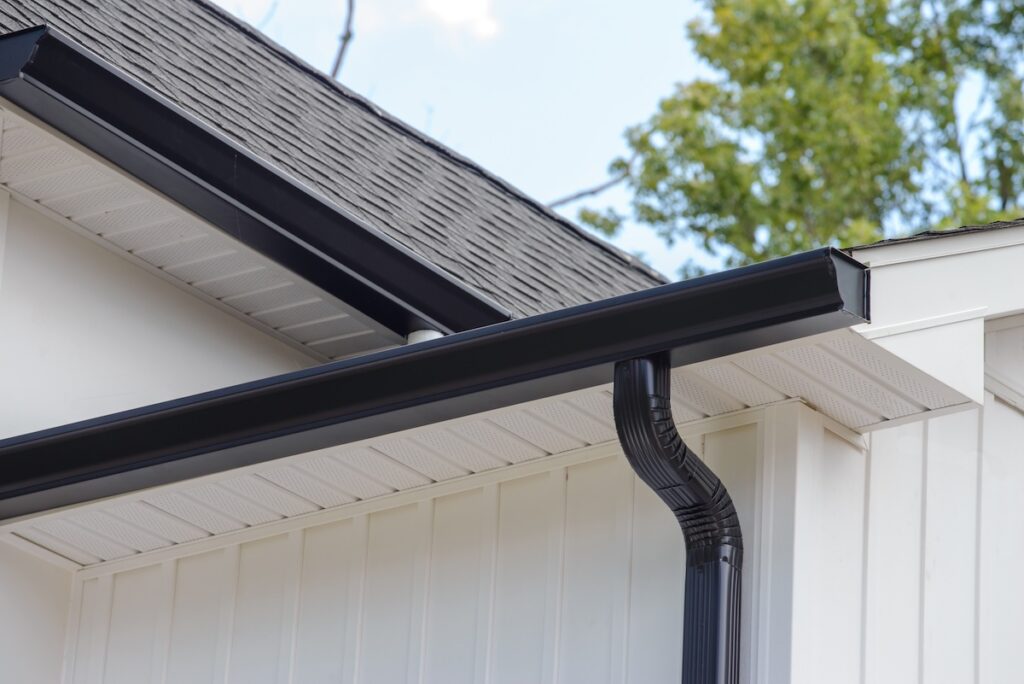rain gutter on roof with downpipe