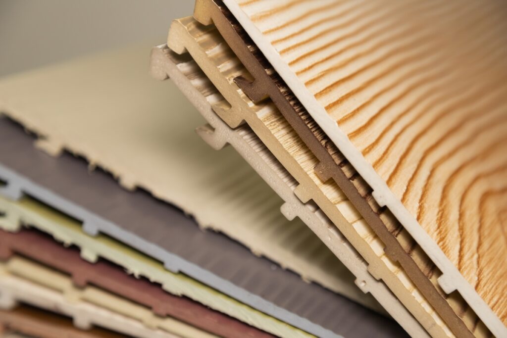 Siding panels cut, showcasing close up the colors and texture options