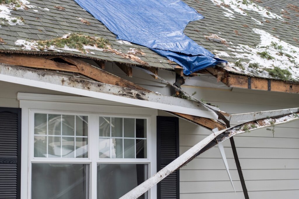 Summer storm causes damage to roof and gutters
