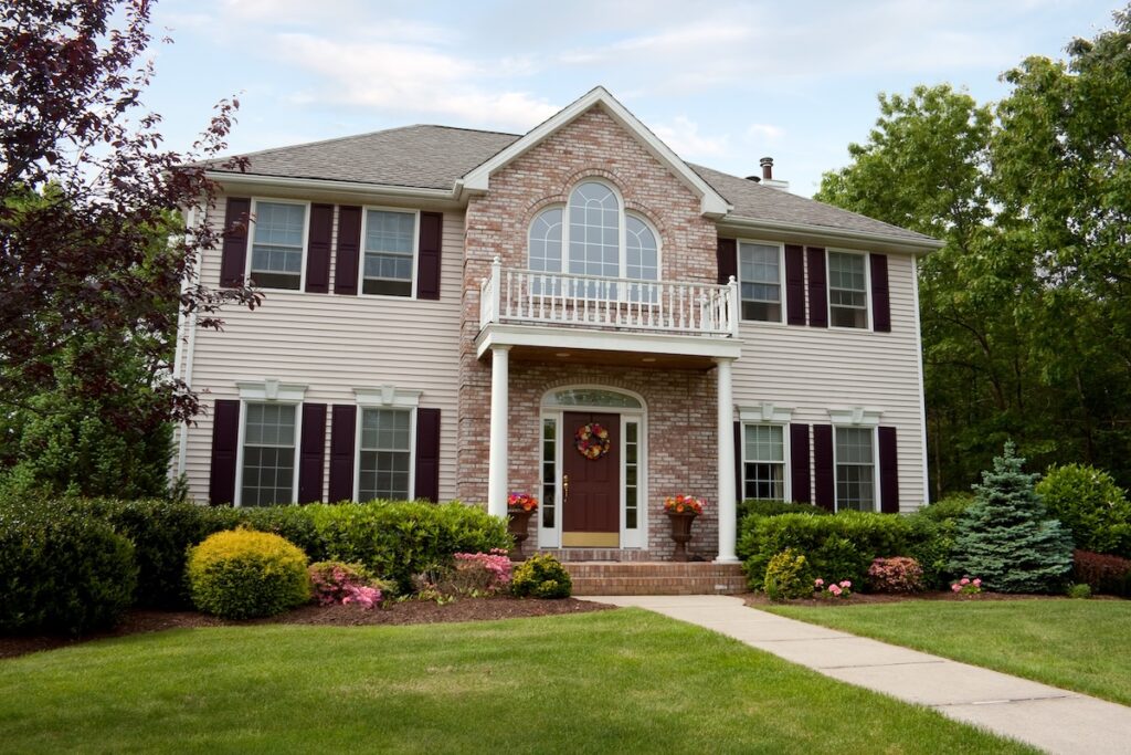 A modern custom built home in a residential neighborhood